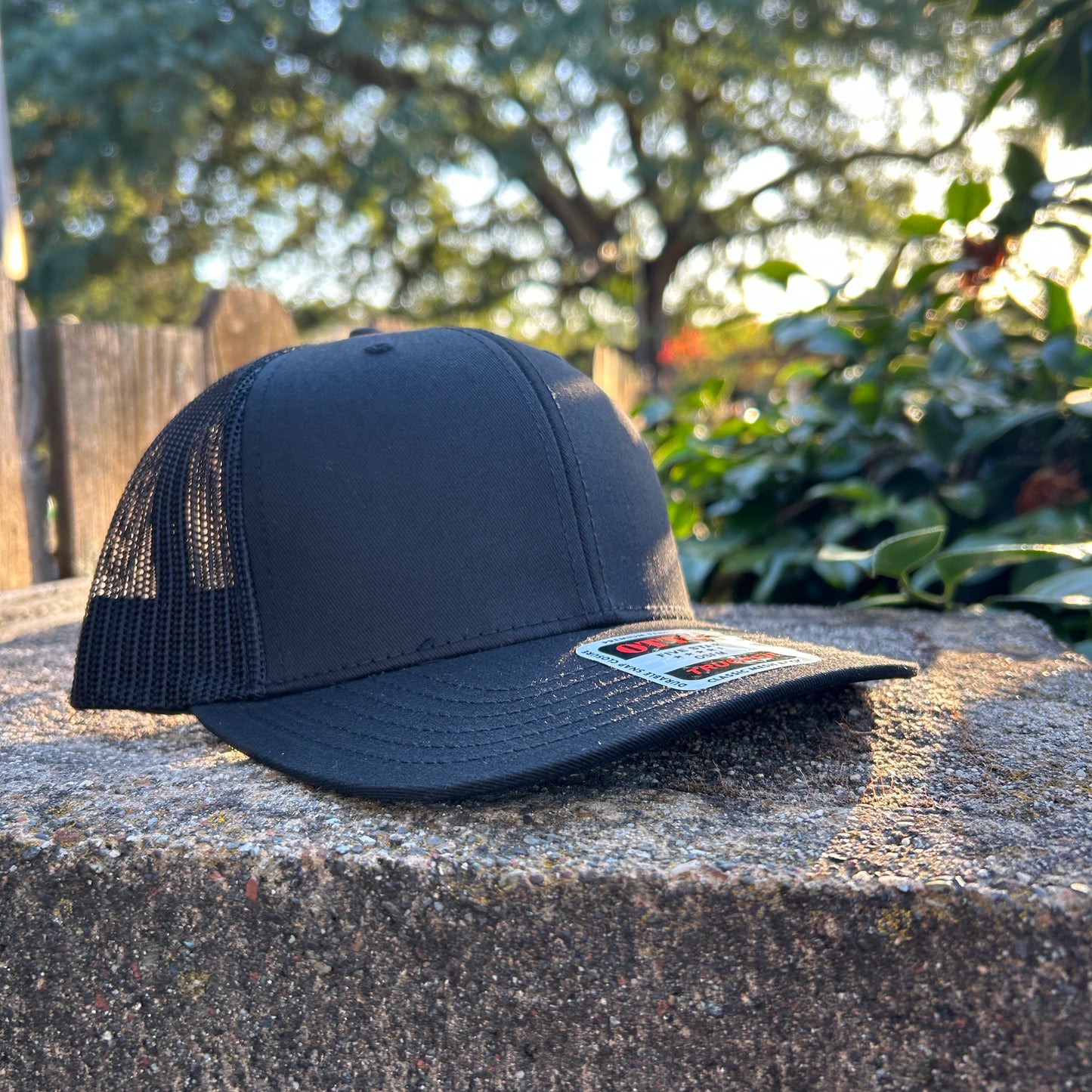 Livorna Black 6 Panel Trucker Hat